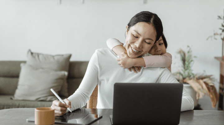 busy mom working from home with child